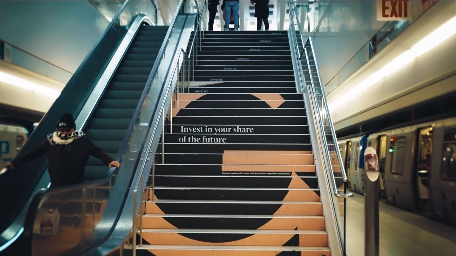 Grayscale advertisement on stairs (Grayscale)