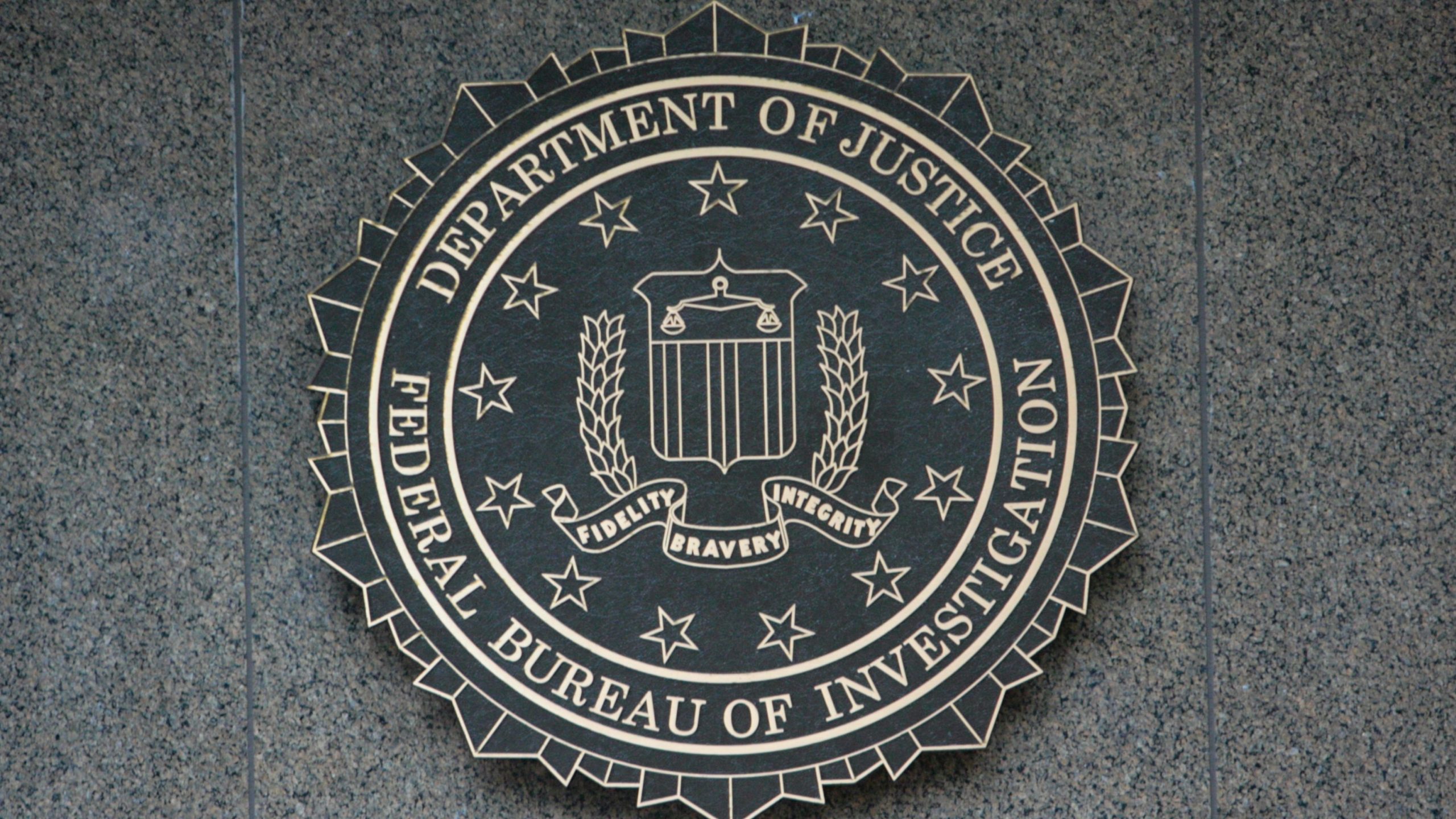 FBI symbol on side of a building.