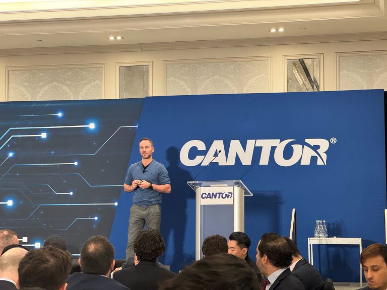 Tether CEO Paolo Ardoino on stage at Cantor Fitzgerald's event in New York (Helene Braun/CoinDesk)